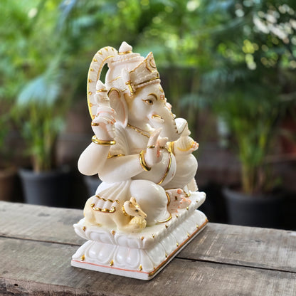 19" Chaturbuja Ganesha in Marble, this sitting posture of Ganesha on lotus base makes it even more attractive.