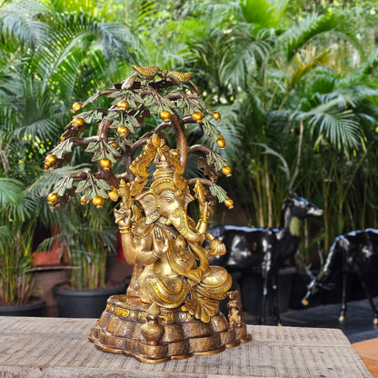 23 Inch Brass Ganesha Idol Sitting Under Tree.
