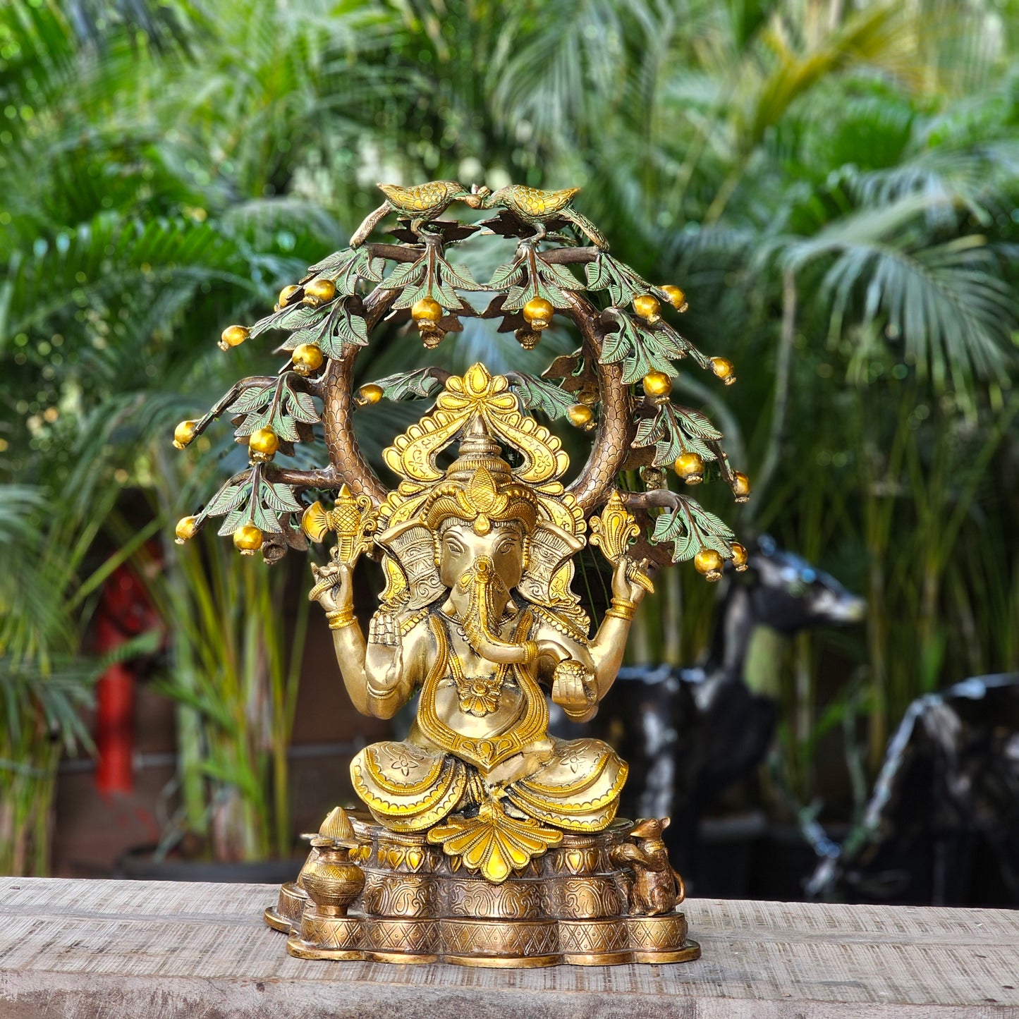 23 Inch Brass Ganesha Idol Sitting Under Tree.