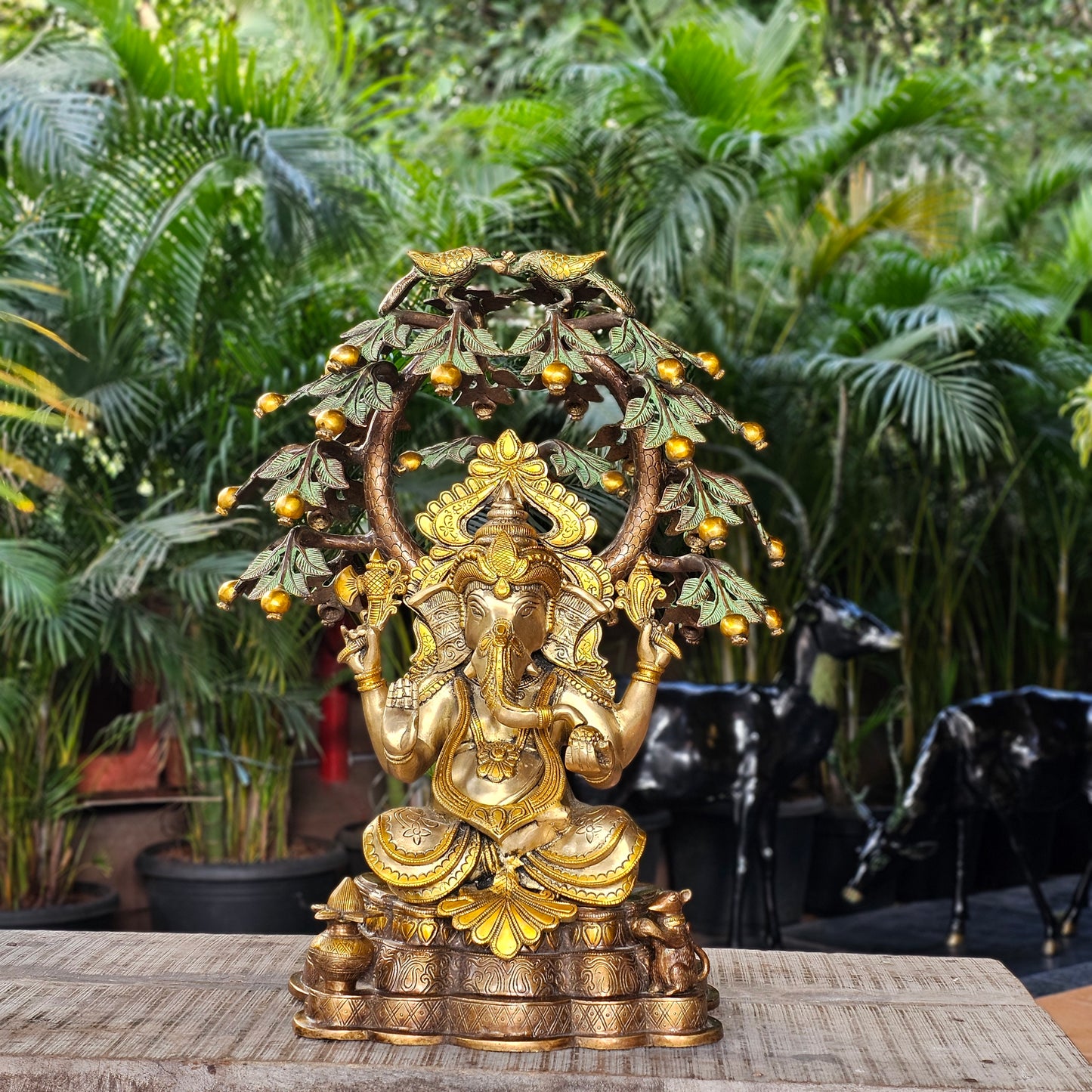 23 Inch Brass Ganesha Idol Sitting Under Tree.