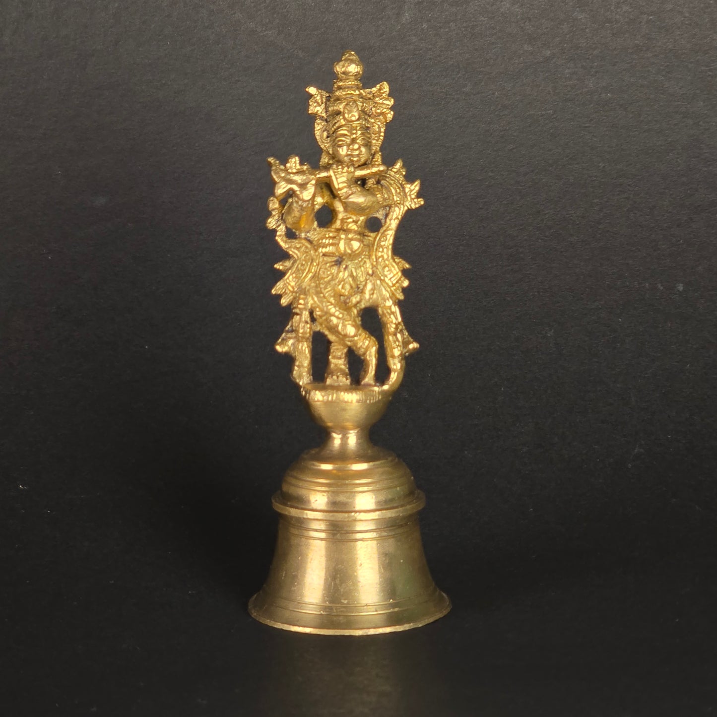 5.5" Krishna Hand Bell In Brass.