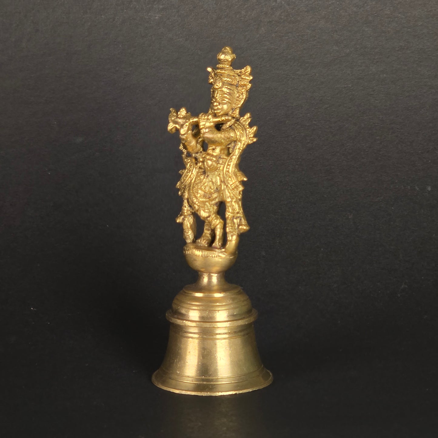 5.5" Krishna Hand Bell In Brass.